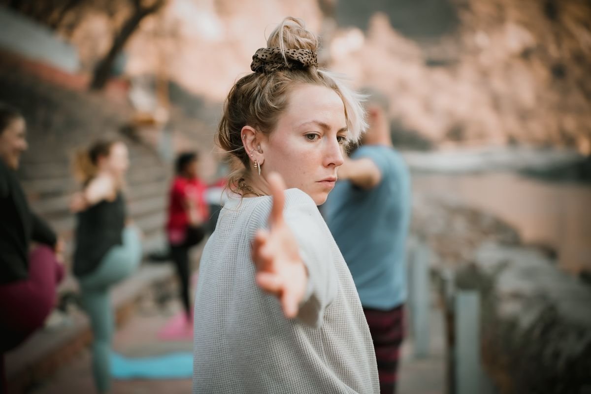 Young woman practising yoga in nature